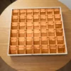 Earring display tray – 42 slots in orange velvet – Ivory & Orange jewellery safe drawer design | Jewelry safe Abu Dhabi & Dubai